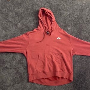 A Nike sweatshirt, has 1 stain but feels very soft and used
